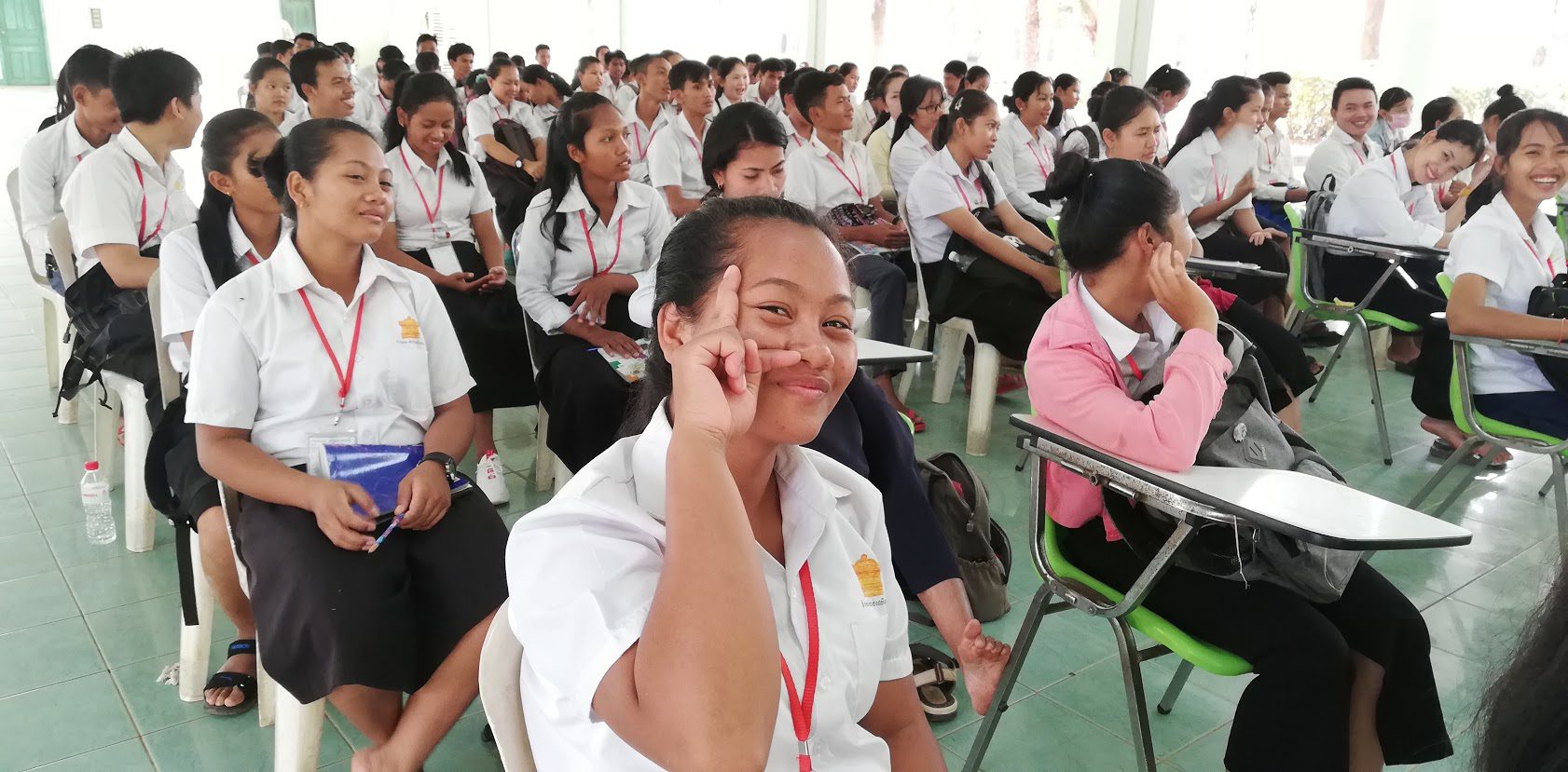 students in Kampong Thom listening to a talk on social media